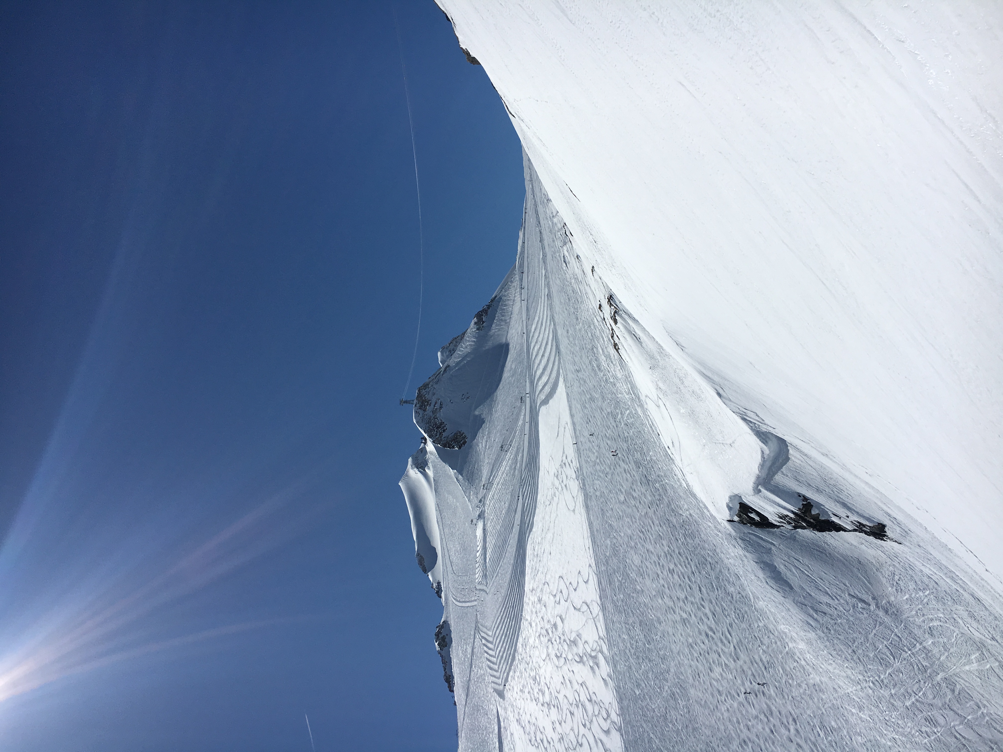 Sunlit mountain slope at golden hour